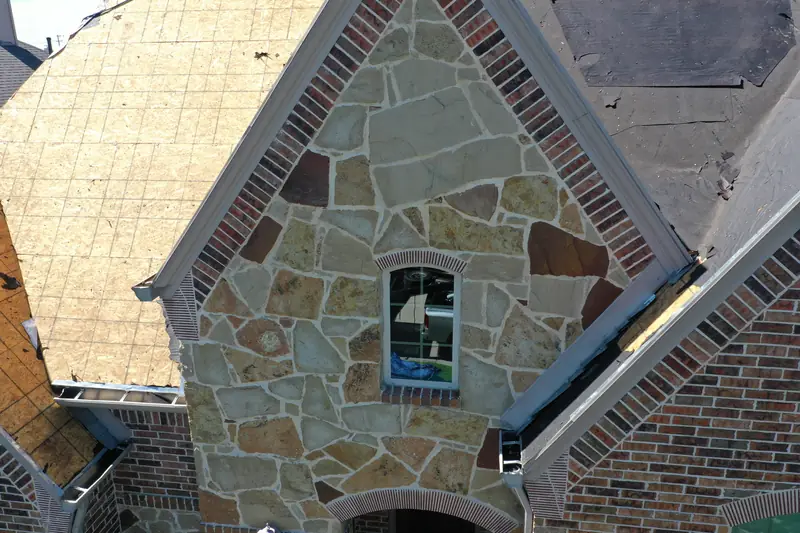 New decking on a stone gable